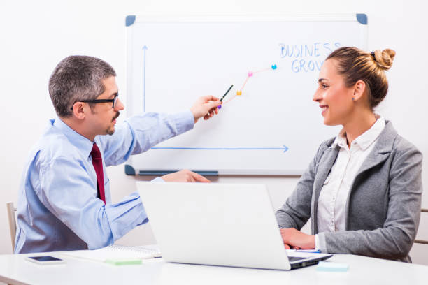 Business people are having meeting in office.